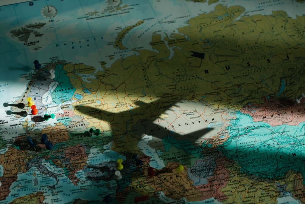 Shadow of an airplane on a map of Europe, highlighting travel and exploration concepts.